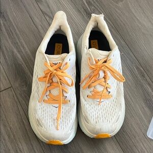 White Sneakers with Orange Accents